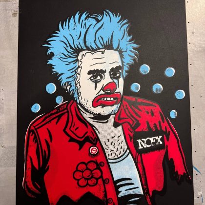 Flat lay of Cokie the Clown fan art hand screen printed with three colors on 8x10 cardstock