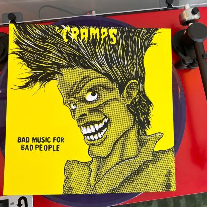 Studio-style photo of the finished screen print, highlighting the handmade nature and punk-inspired aesthetic of the artwork.