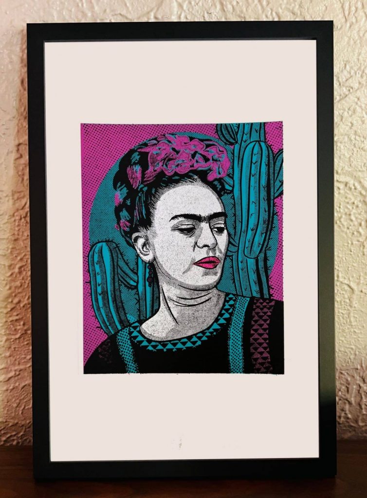Hand-pulled Frida Kahlo screen print featuring a colorful portrait created from a digital drawing and printed with three watercolor-inspired inks on 11x17-inch 100lb cardstock with a wide white border.