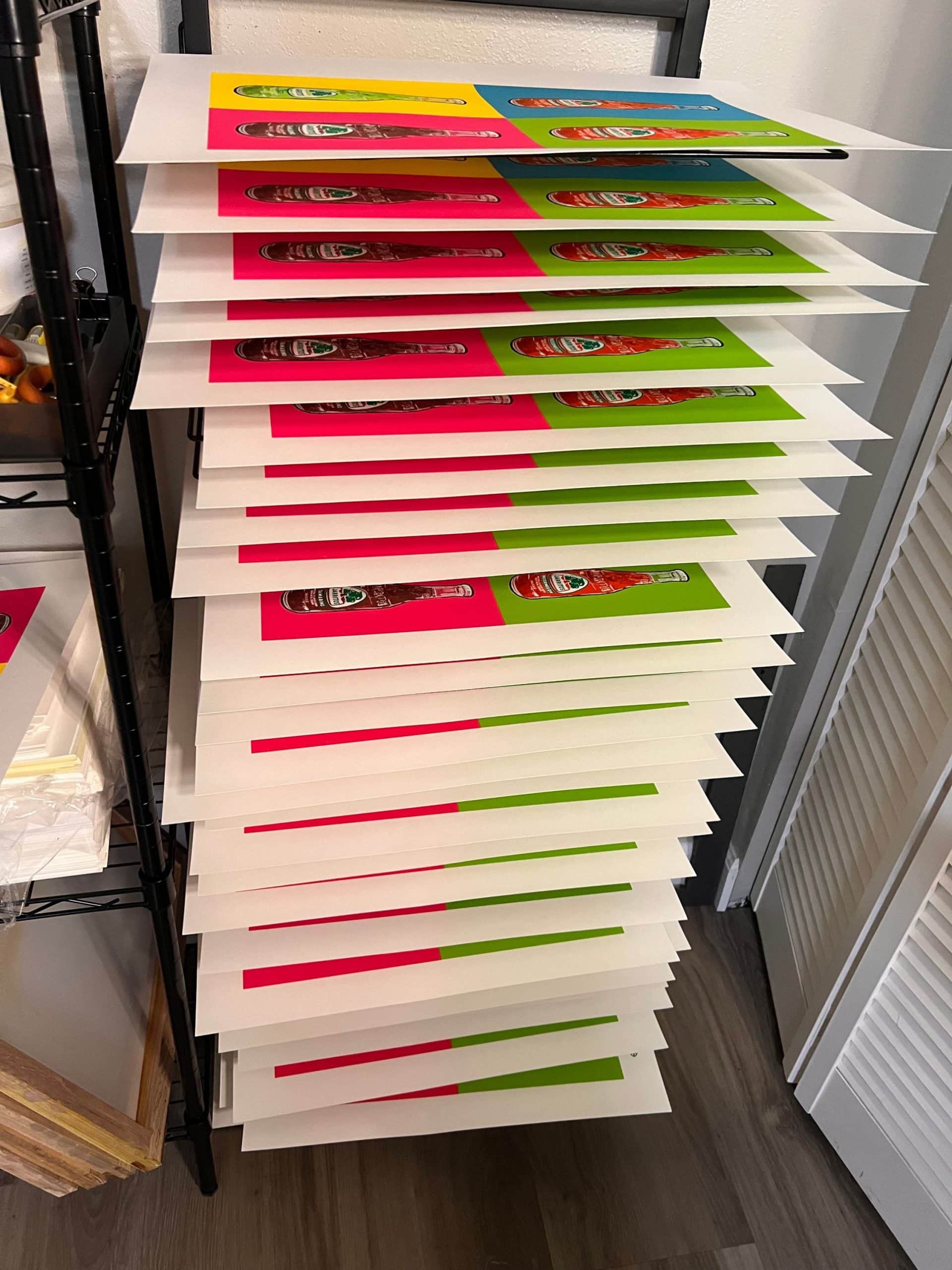 Finished Jarritos-inspired screen print drying after all 10 water-based ink colors have been successfully printed.