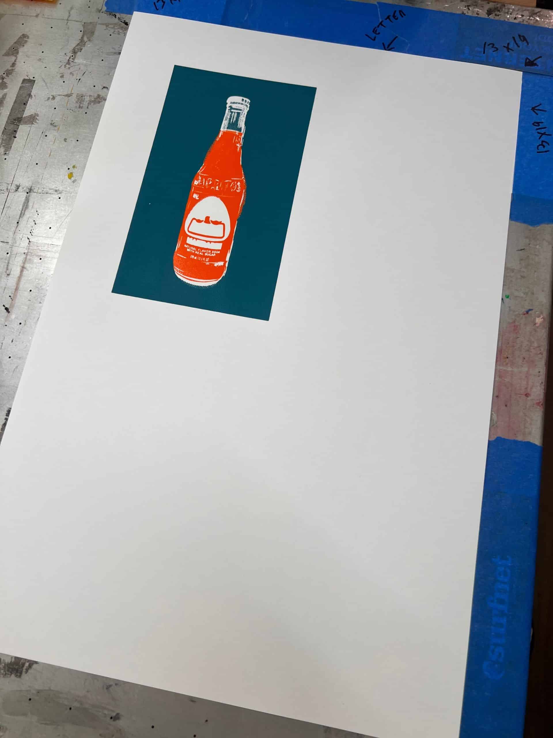 Early stage Jarritos-inspired screen print showing the first two colors printed and aligned on French Paper.