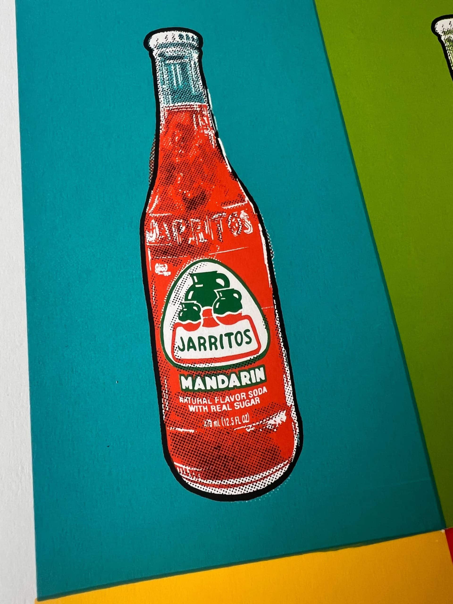 Close-up detail of Jarritos flavor artwork featuring bold colors, layered inks, and pop art-inspired graphics.