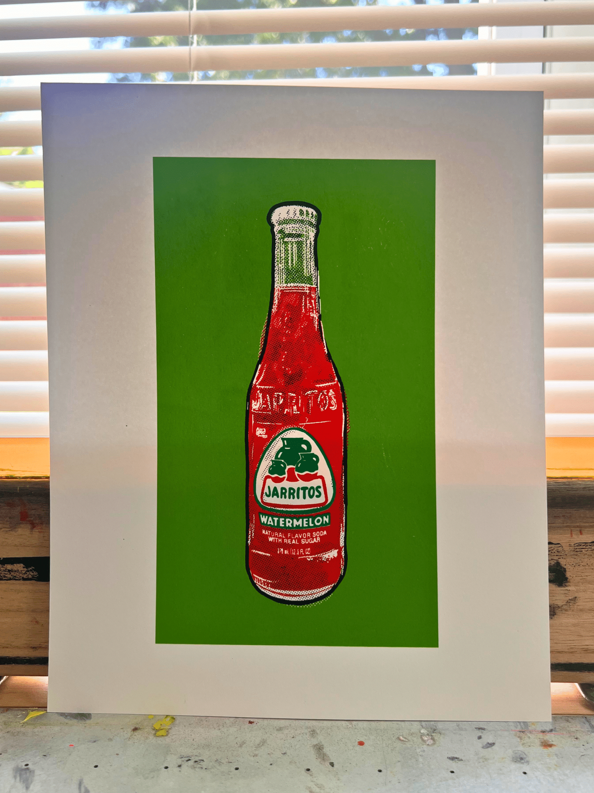 Jarritos watermelon pop art screen print standing upright to show its 8-by-10-inch size and vivid colors.